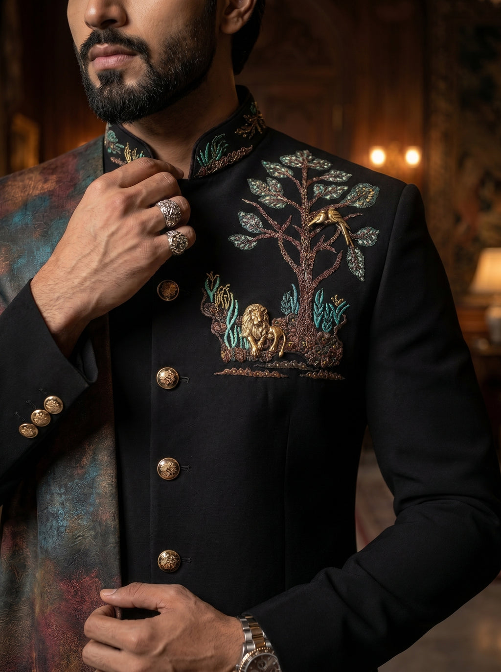 Achkan with metal broach and thread embroidered with a stall