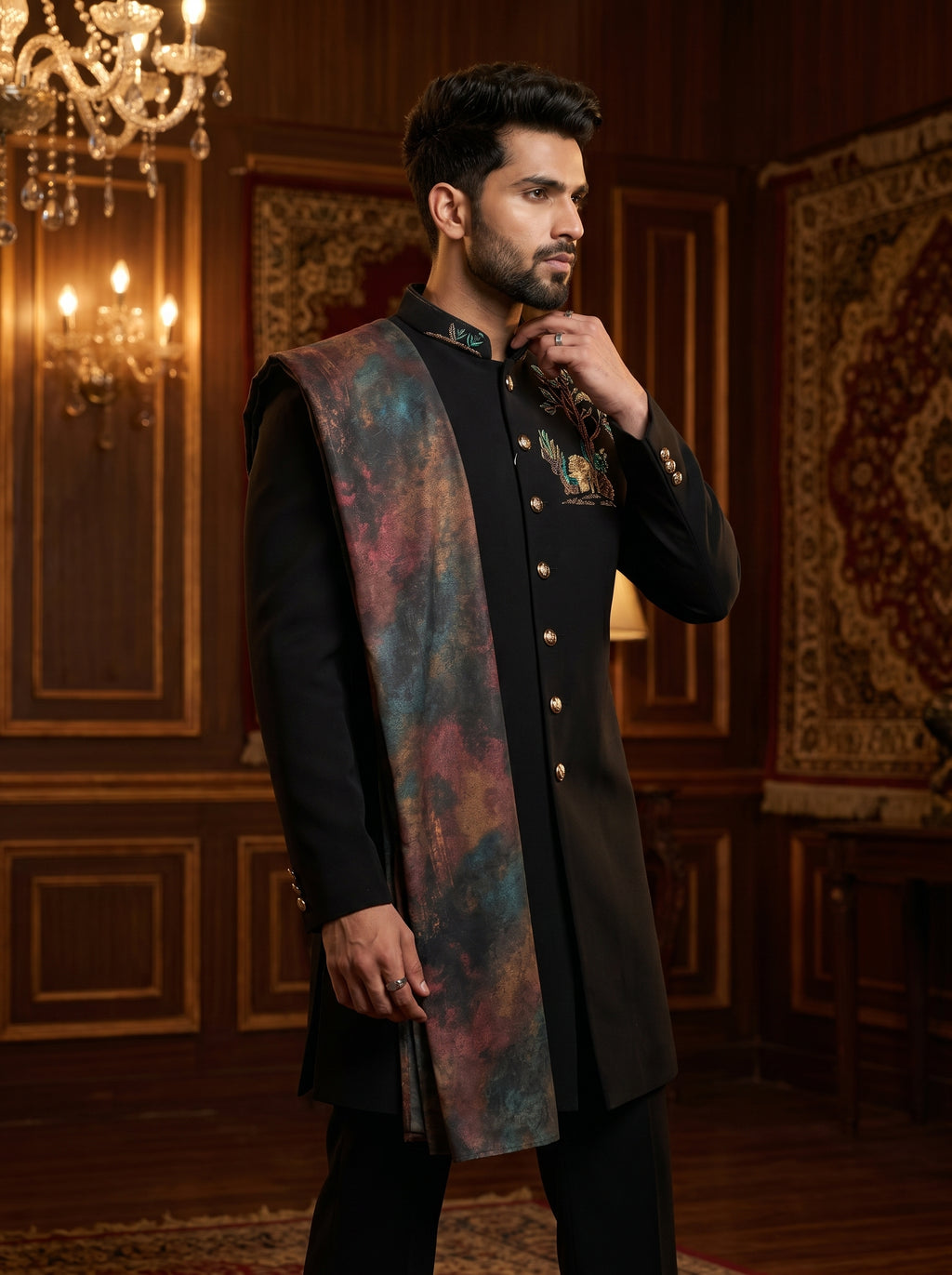 Achkan with metal broach and thread embroidered with a stall